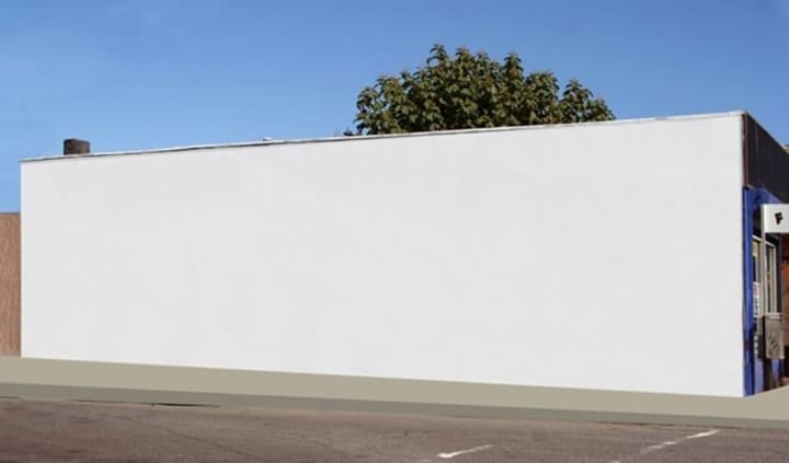 The side of this New Rochelle building will soon be adorned with a mural to brighten downtown. 