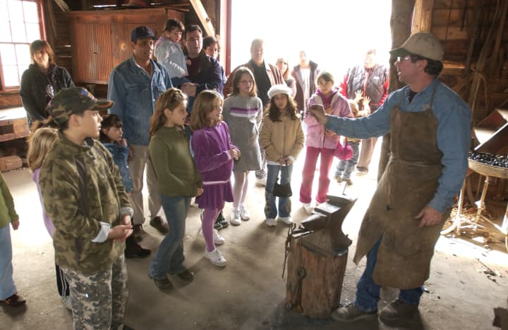 A blacksmithing demonstration at Muscoot Farm.