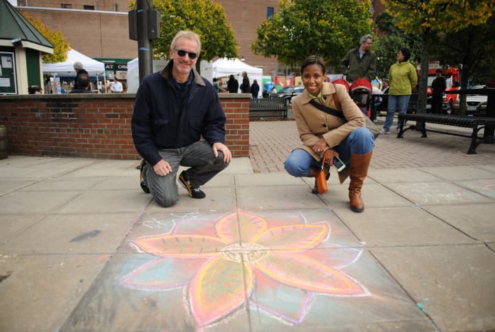 Ossining Village Manager Richard Leins and Ingrid M. Richards, Manager of Downtown &amp; Economic Development, at the Village of Ossinings First Annual Chalk It Up! Festival held recently at Market Square.