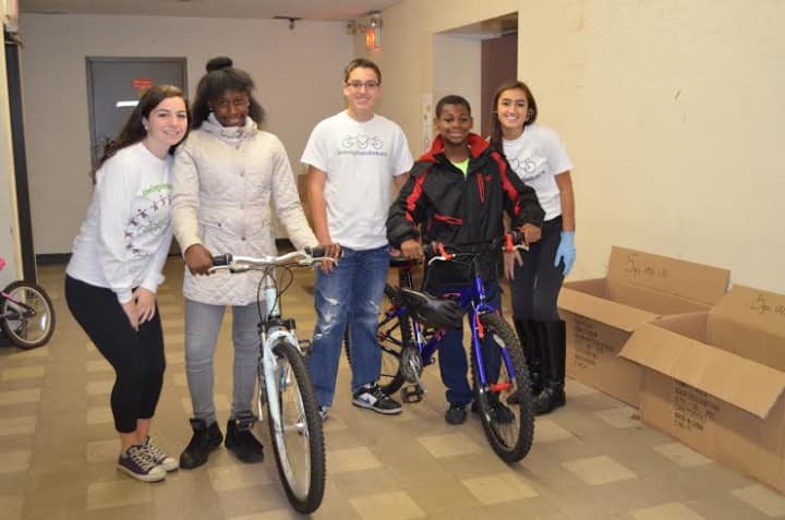 The bikes were distributed at Hope Community Services in New Rochelle. 