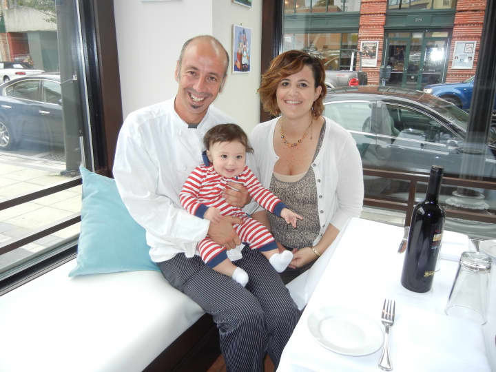 Pasquale De Martino and Jennifer Galletti, owners of Trattoria &#x27;A Vucchella, with their son, Michele.