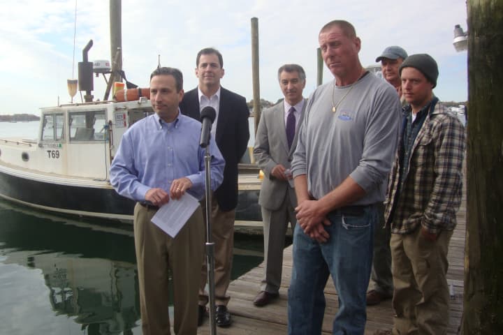 Sen. Bob Duff, Rep. Chris Perone, Sen. Carlo Leone, Mike Kalaman, Norm Bloom and Charlie Wetmore gather in Norwalk to celebrate the return of lobsters to Long Island Sound after the banning of two pesticides.