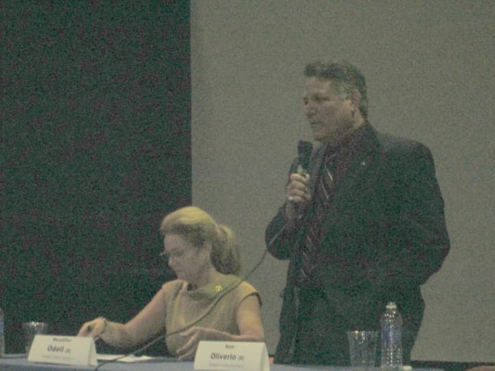 MaryEllen Odell and Sam Oliverio at a debate for county executive in Carmel.