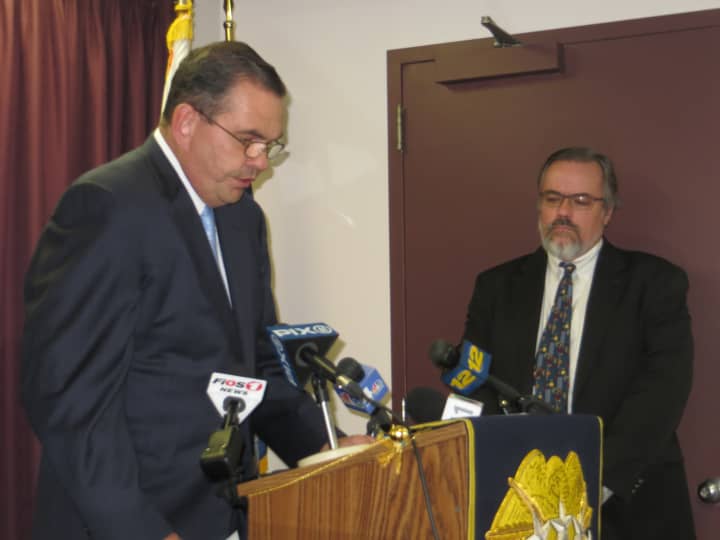 The head of the Westchester County Department of Public Safety, George N. Longworth, left, (shown at an unrelated meeting in Pleasantville.) refused to discuss the credentials of suspended police chaplain Jeremy Reichberg in public recently.