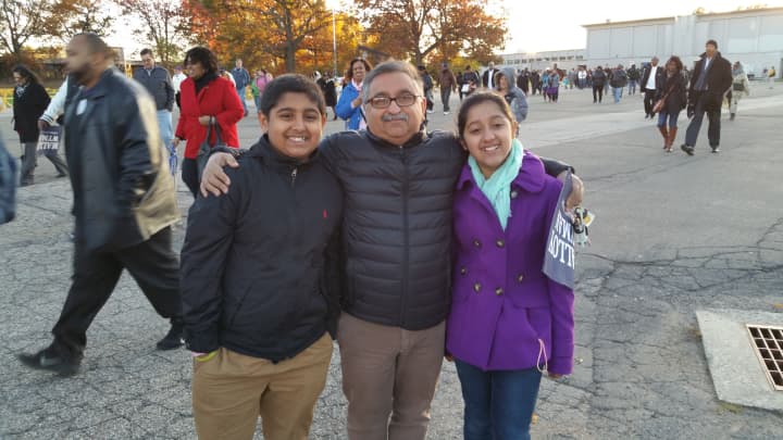 From left: Tahah Malik, Kalim Malik and Aytal Malik are excited to see the president on the campaign trail.