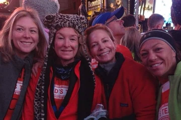 Claire Gladstone, second from left, joins members of Fred&#x27;s Team at the TCS New York City Marathon on Sunday. 