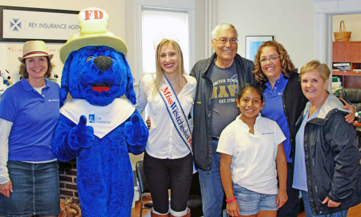 Attendees at Rey Insurance&#x27;s Child ID Day got to hang out with Ernie the Big Blue Safety Dog. 