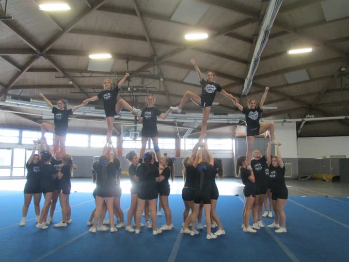 The Hendrick Hudson cheerleading squad practicing its pyramid. 