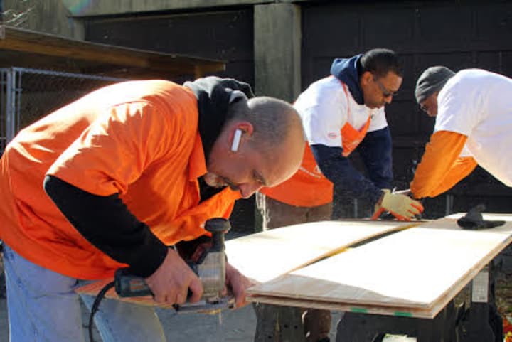 Home Depot volunteers from Port Chester helped build shelters for homeless cats at Harrison&#x27;s Pet Rescue on Sunday.