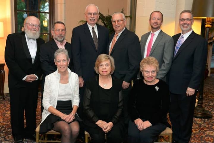 Top row, from left, honoree Andrew Malcolm, Steven Friedman, Jack McLaughlin, 
William Mulligan, Jr., Dave Dobell, and honoree Dan Bena. Seated, from left, Debbie Clark, Susan Guma, gala co-chair, and Elin Howe. 