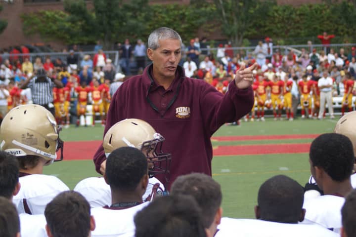 Iona Prep head coach Victor Quirolo talks to his team during a game last year.