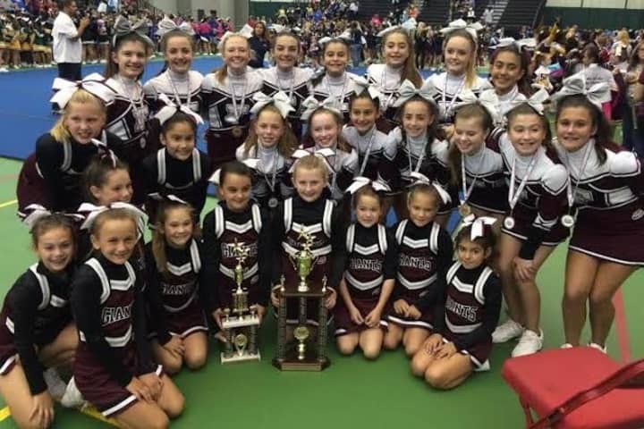 The Fairfield Giants Junior Midget cheerleaders won the New England Pop Warner championship, and qualified to compete in the national championship next month in Orlando, Fla. 