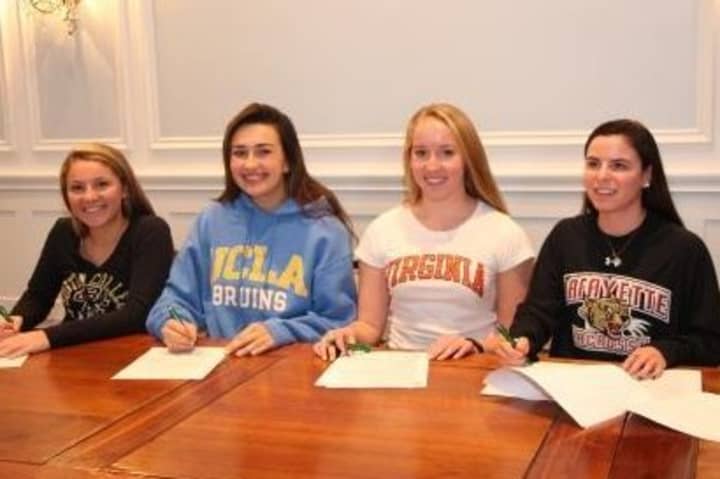 Convent of Sacred Heart ahtletes (from left) Jacqueline Urbinati,, Natalie Puente, Kristen Parkinson and Emma Novick sign National Letters of Intent on Wednesday.