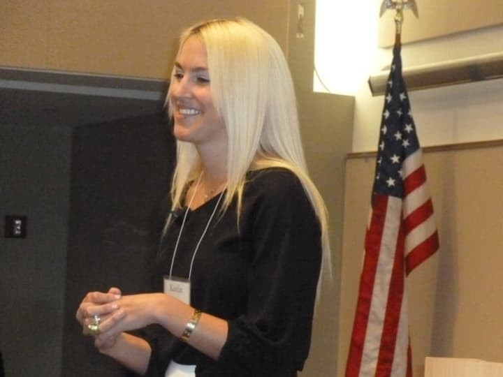 Kaitlin Roig-DeBellis, a teacher who survived the Sandy Hook School shooting, speaks at a conference on trauma and healing at UConn-Stamford Wednesday.