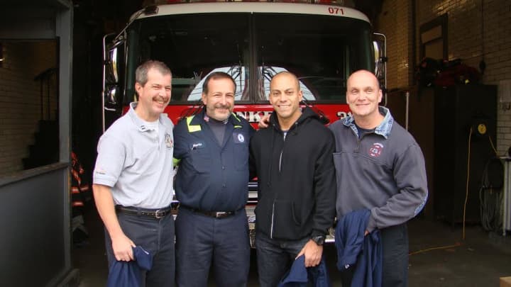 From left are Capt. Robert Levine, Mario Sindona, Lt. Victor Rodriguez and Firefighter Thomas McKee. 