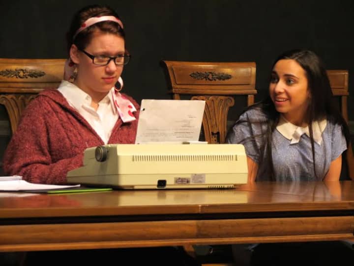 John Jay High School junior Ellie Fritsch and sophomore Jenny Sokol act in separate scenes, both set in a dining room.