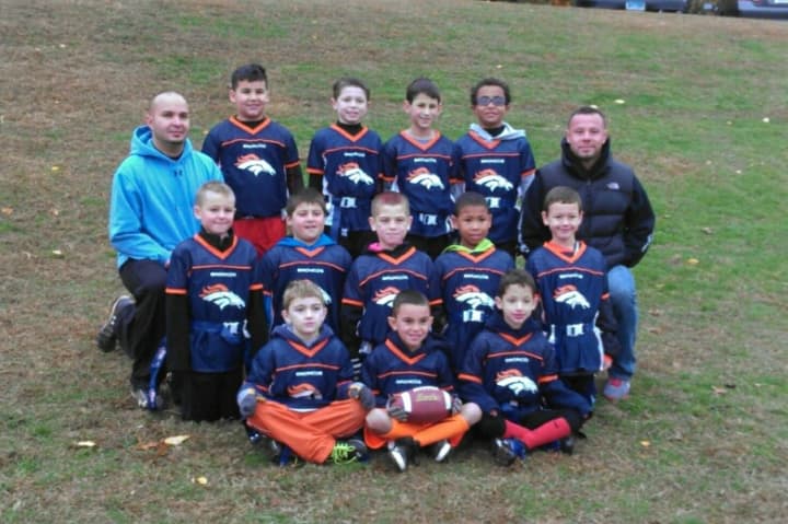 The Norwalk Flag Football Denver Broncos were undefeated due to their team work and dedication this season. 