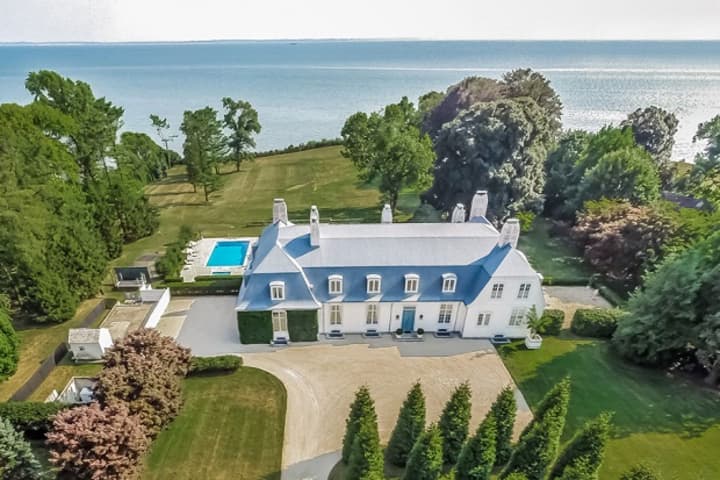 1131 Sasco Hill Road, Fairfield, CT listed with KMS Partners embraced by 450&#x27; of Long Island Sound waterfront