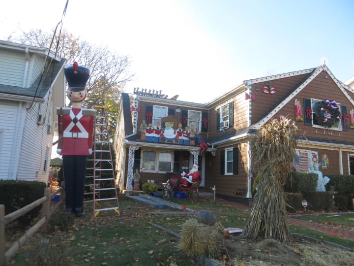 A Harrison homeowner at the corner of Parsons Street and Oakland Avenue took advantage of milder temperatures Thursday, Nov. 20, to put up his annual Christmas decorations.