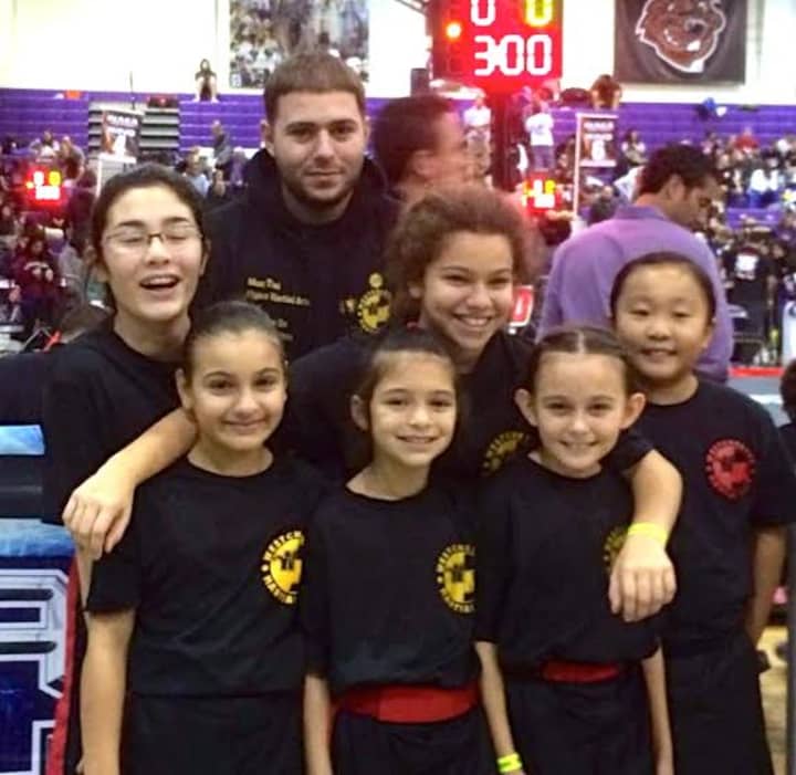 Pictured at the NAGA Championships with their instructor Ron Barone, from left: Emma Keegan, Maria Cristo, Amanda Monteleone, Isabel Macera, Alexa Grassi and Audrey Horn.