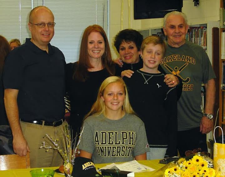 Emily Power signs with Adelphi University. 