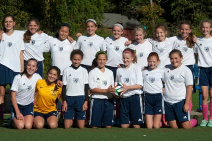 The Wilton Under 13 Blue girls soccer team earned a share of the league championship.