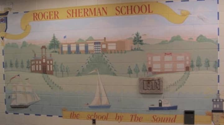 The Roger Sherman school is encouraging fathers to engage in its new program to motivate children and to serve as role models.
