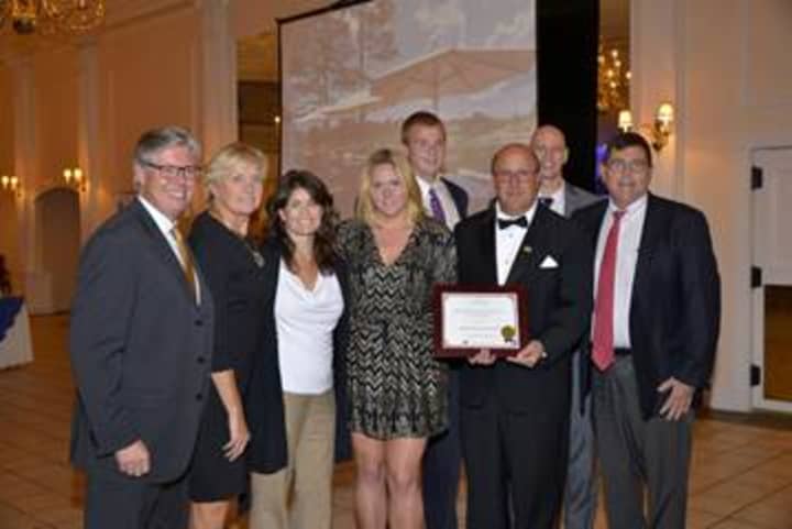 Murphy Brothers of Mamaroneck team members recent awards with project leaders and officials . Left to right are Michael Murphy, Diane Murphy, Lois Arena, Laura Murphy, C.J. Murphy, Norton Wheeler, Nils Fredricksen and Chris Murphy.
