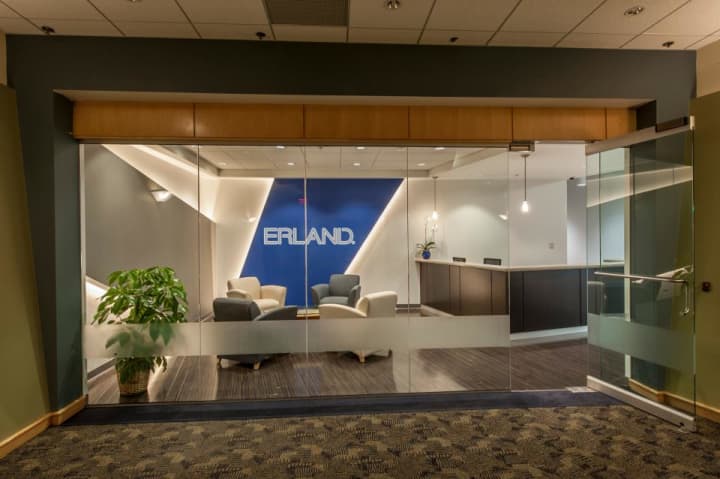 The Erland Construction Inc. office in Stamford is growing with new staff working on the Summer House Project.