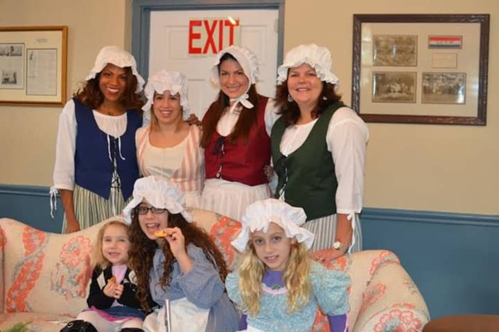 Guides in Colonial-era garb from the Junior League of Central Westchester in Scarsdale at the open house in 2013.
