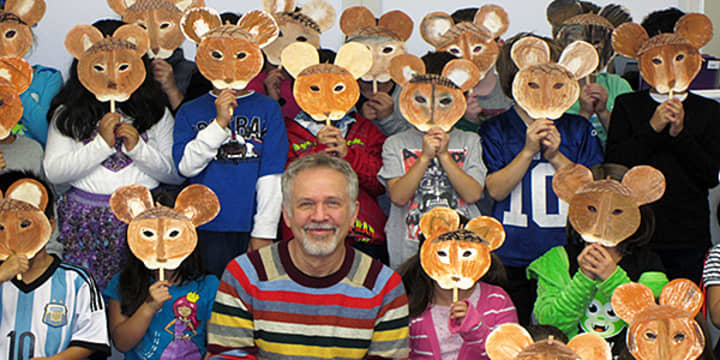 Daniel Kirk and the students after they created their &quot;Library Mouse&quot; masks.
