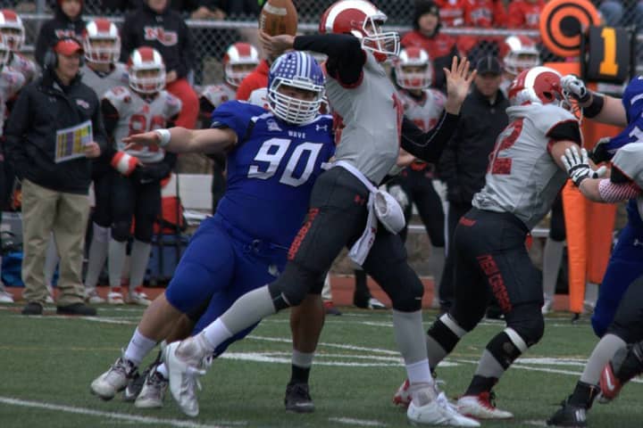 Darien&#x27;s Mark Evanchick leads the state with 21 sacks heading into Saturday&#x27;s Class L playoff game against Naugatuck.