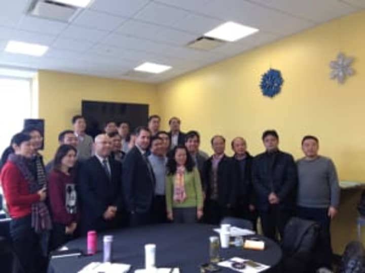Mayor Noam Branson met with a group of government and business officials from China Dec. 2 at Monroe College.