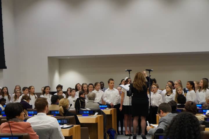 Carrie E. Tompkins Elementary School fourth-graders sang during the United Nations 25th anniversary celebration for the Convention on the Rights of the Child.