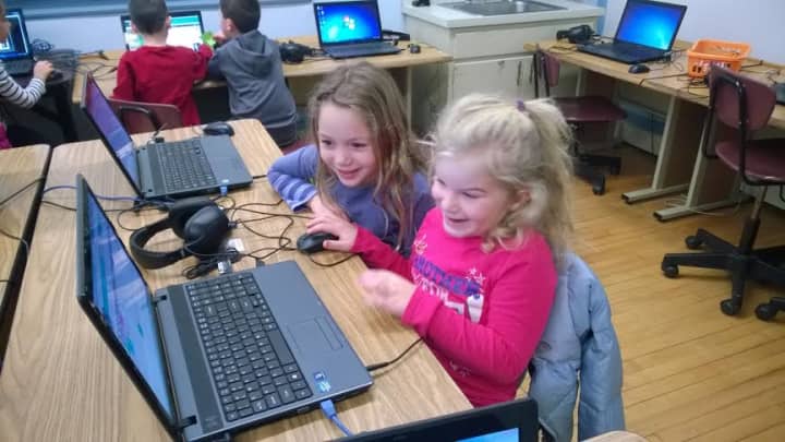 Mamaroneck Avenue School first- graders, Sofia Butini and Katarina Jone, discover the pure fun of creating and running their own code.