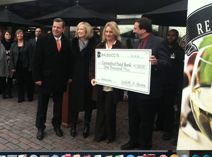 Balducci&#x27;s donated $1,000 to the Connecticut Food Bank as the market celebrated its grand re-opening Friday. From left Rich Durante, COO Balducci&#x27;s; CEO Judy Spires; Theresa Dobson, from the food bank and Steve Brownstein, Balducci&#x27;s manager.