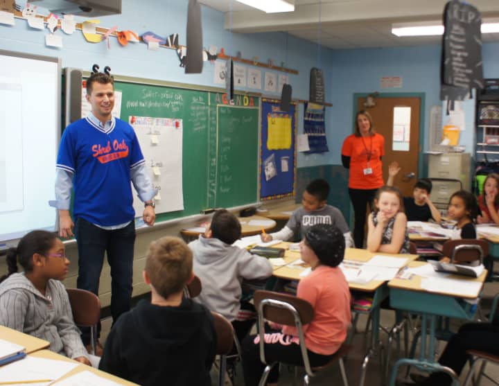 Baseball player Joe Panik talks pupils at George Washington Elementary.
