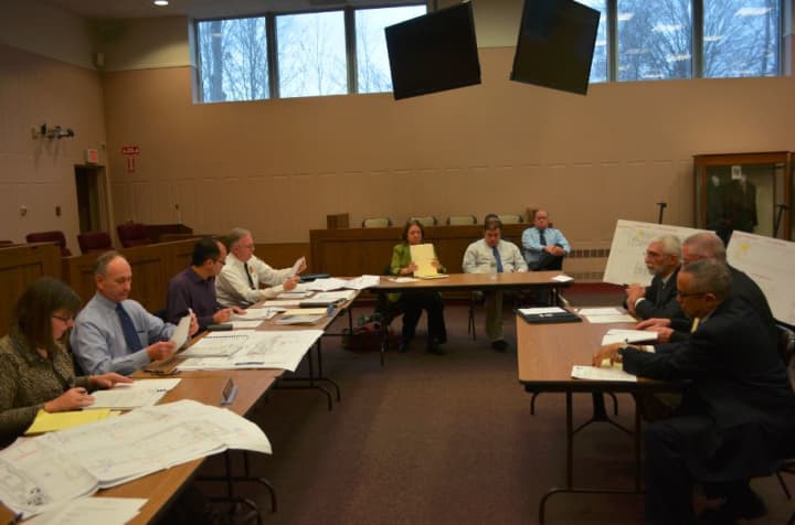 State review board members (left) and Conifer&#x27;s project team (right).