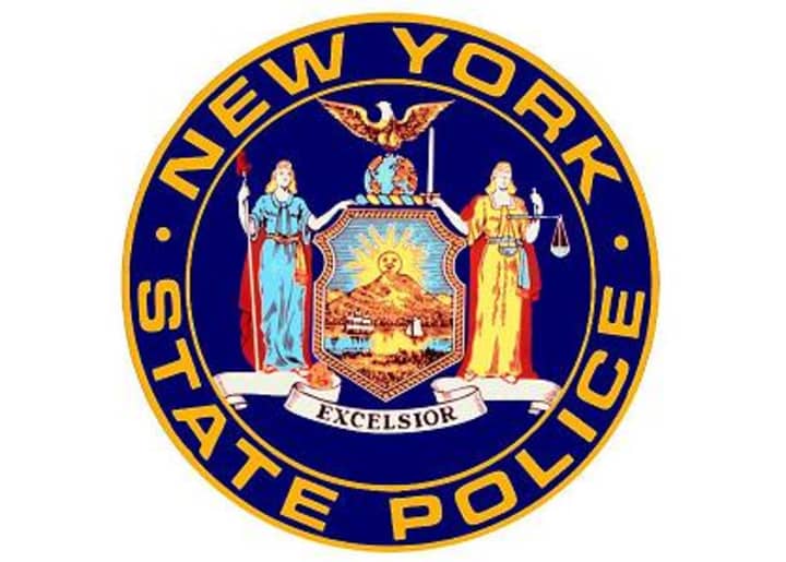 New York State Police officials took a suspect into custody after he allegedly robbed a Scarsdale gas station. 