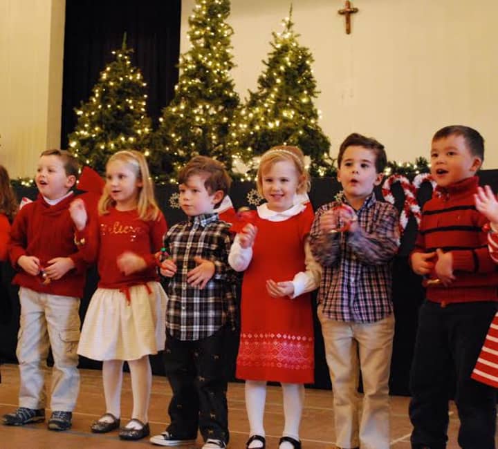 St. John Preschoolers sing holiday songs.
