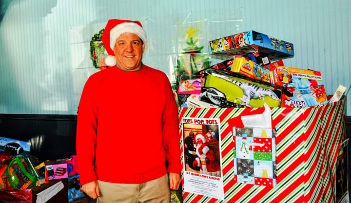 Jim Maisano with some of the toys that were collected.