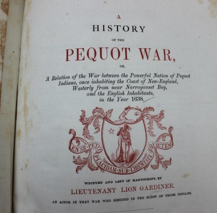 Students explored the Pages from Pequot: Native Americans exhibition of very old and rare books.
