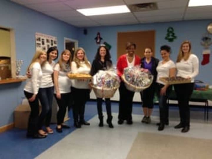 The Junior League of Central Westchester held a bake sale and pizza party to honor Greenburgh Housing Authoritys After-School Programs kids and volunteers. 