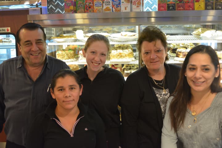 Olympic Diner owner Nick Tsakonitis, with his wife, Veronica, and three staff members.