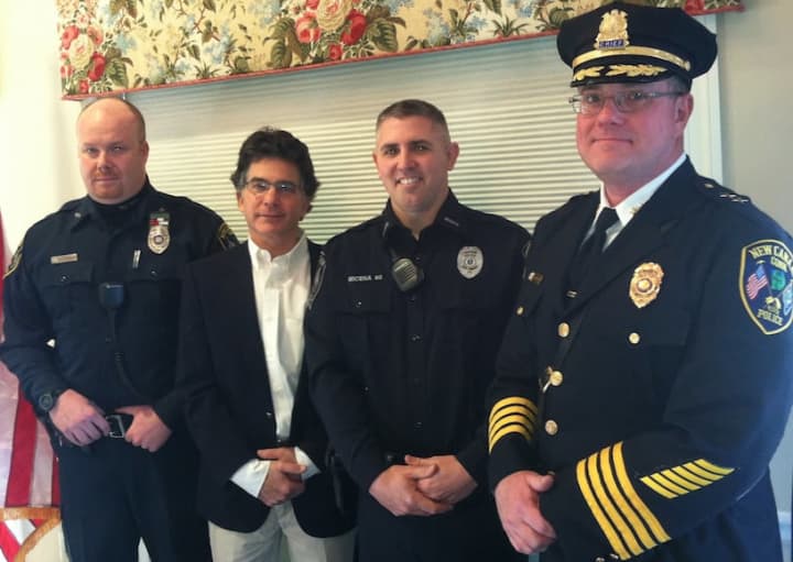 Charlie Taben, second from left, at a ceremony honoring Officers Michael O&#x27;Sullivan, left, and Brian Micena, second from right, for helping to save his life after he had cardiac arrest on Oct. 18. At right is Chief Leon Krolikowski.