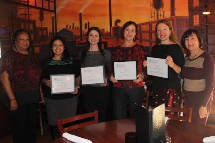 Juanita James, left, presents certificates to Allison Rith of Darien; Chrissy Cacace of Norwalk; Carol O&#x27;Connell of Ridgefield; and Quentin Bell of Greenwich. With them is  Nancy von Euler (FCCF program director).