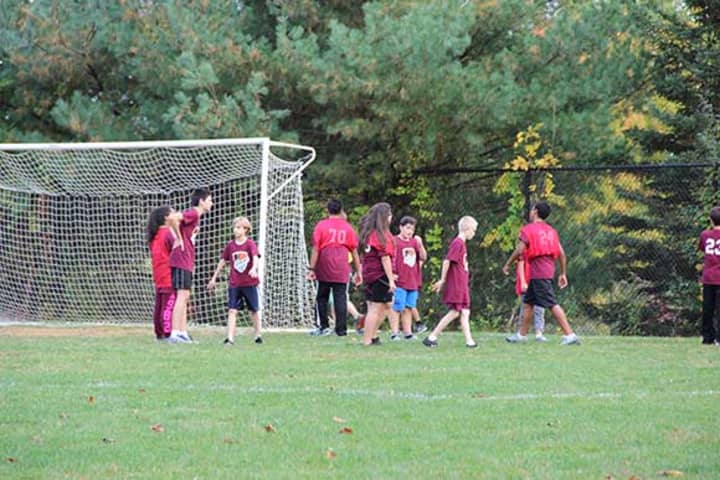 Members of the Danbury Youth Soccer club will be able to keep playing at a field purchased by Danbury Billionaire Peter Buck until they find a replacement.  
