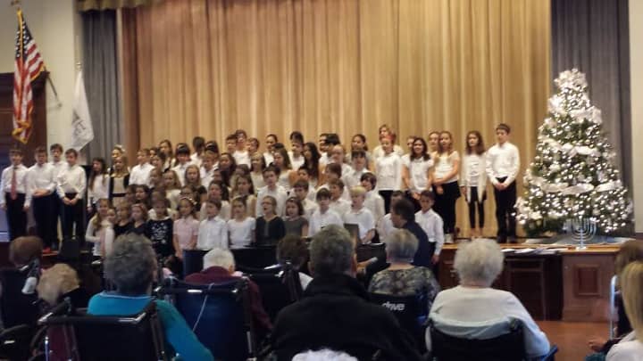 The Milton Chorus performs holiday selections at The Osborn in Rye, NY.
