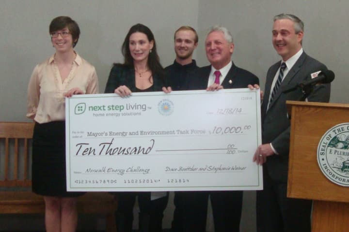 Erin O&#x27;Neill of Next Step Living, Stephanie Weiner and Collin Babbage of New England Smart Energy, Mayor Harry Rilling and Councilman John Kydes with a $10,000 used to fund the new program at the Maritime Aquarium.