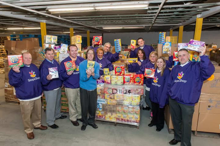 Representatives from Nabisco and the Stop &amp; Shop Supermarket Co. donate pallets of Nabisco food items to the Food Bank of the Hudson Valley.  
